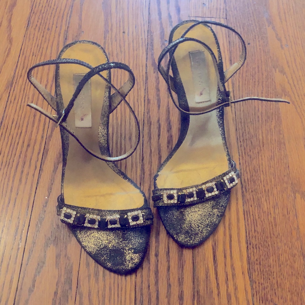 Black And Golden Stilletos